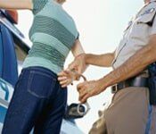 Girl being arrested by a police - Law services in Sterling Heights Girl being arrested by a police - Law services in Sterling Heights
