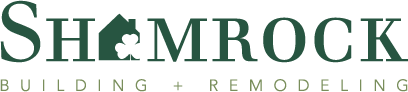 The shamrock building and remodeling logo is green and white.