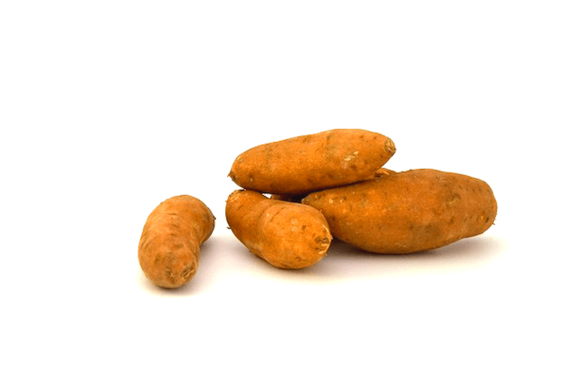 Sweet Potato A pile of sweet potatoes on a white background