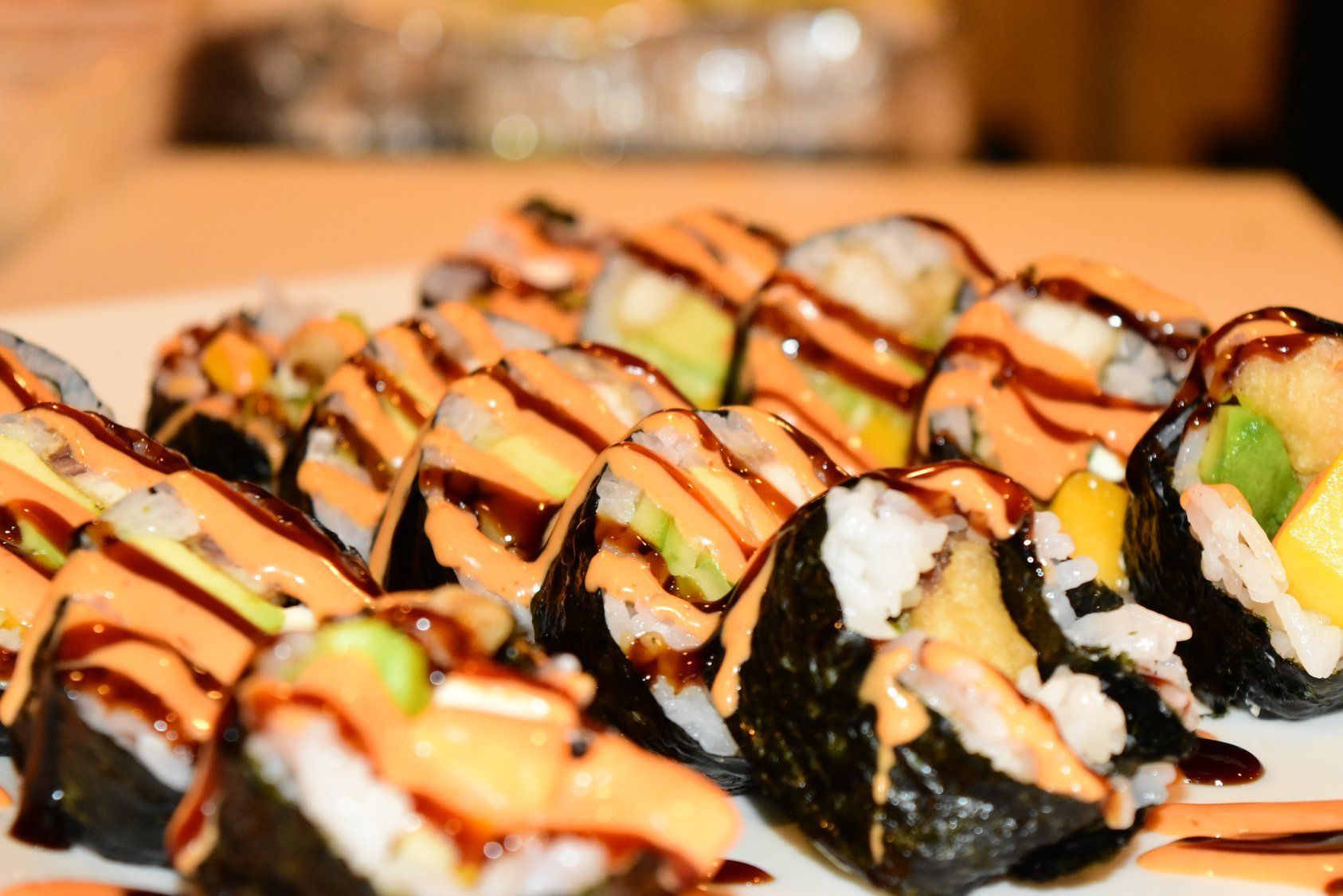 Buffet — Sushi Rolls Topped with Pink Sauce in Chico, CA
