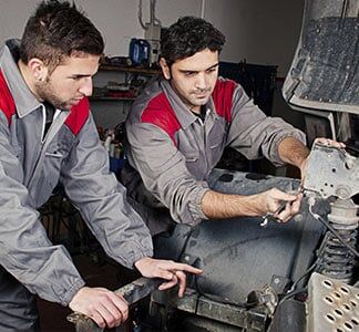 Mechanics Working on Truck - Axle Repairs in York, PA Mechanics Working on Truck - Axle Repairs in York, PA