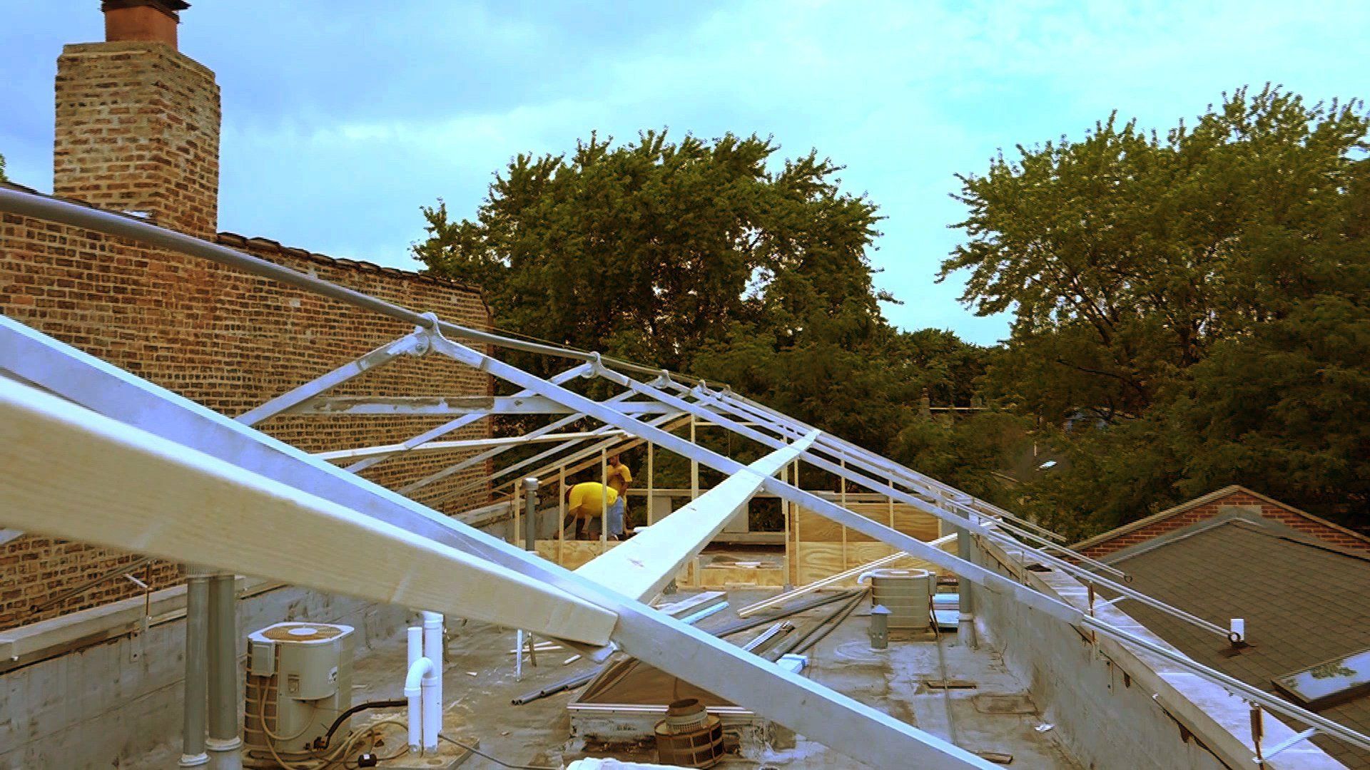 Roof framing with steel beams for construction tent