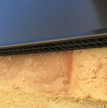 Close up of WickRight Metal Coping Vent installed, Chicago