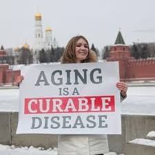 Woman holding a sign: 