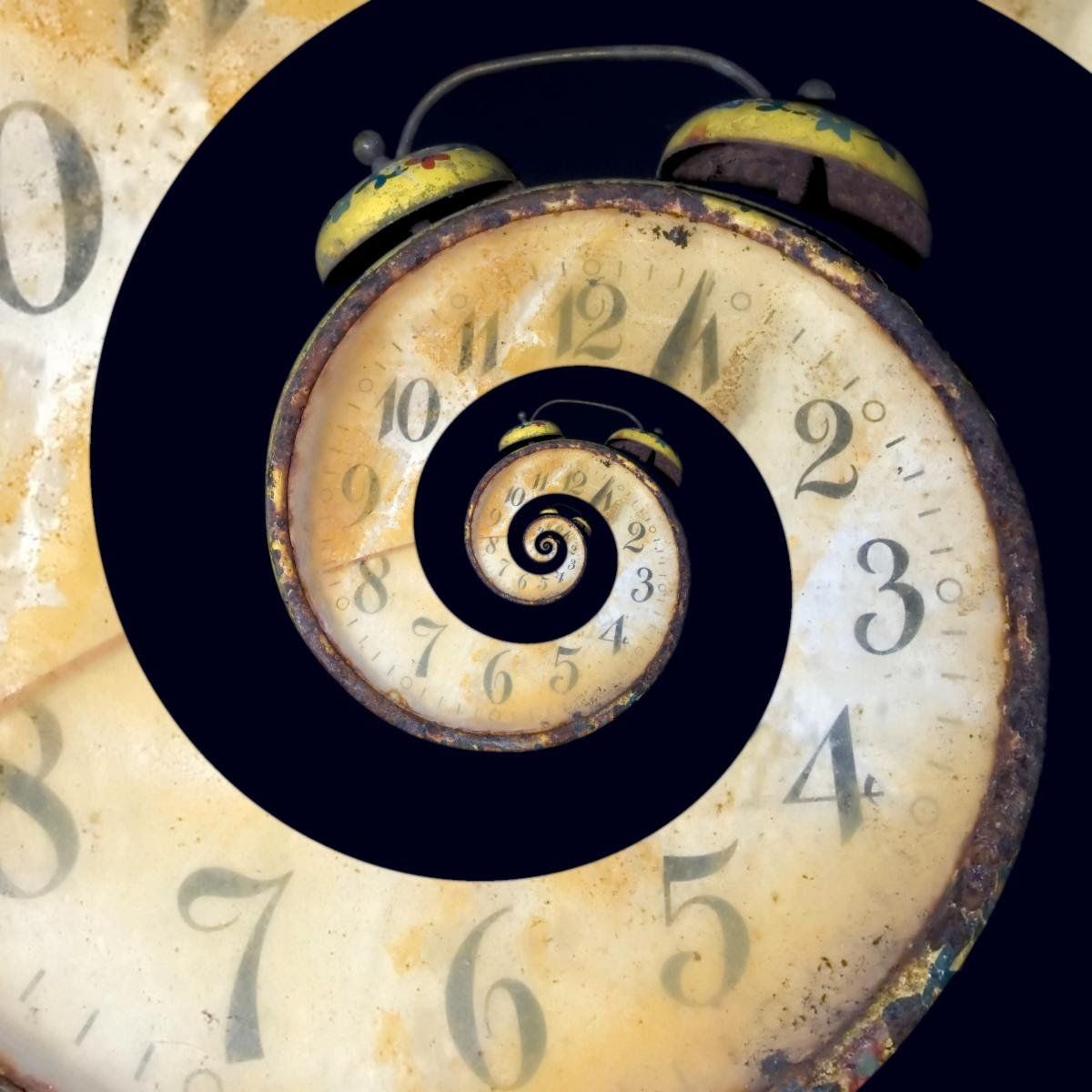 Spiral clock face, old and rusty, against black background.