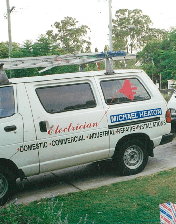 A white van says michael heaton on the side