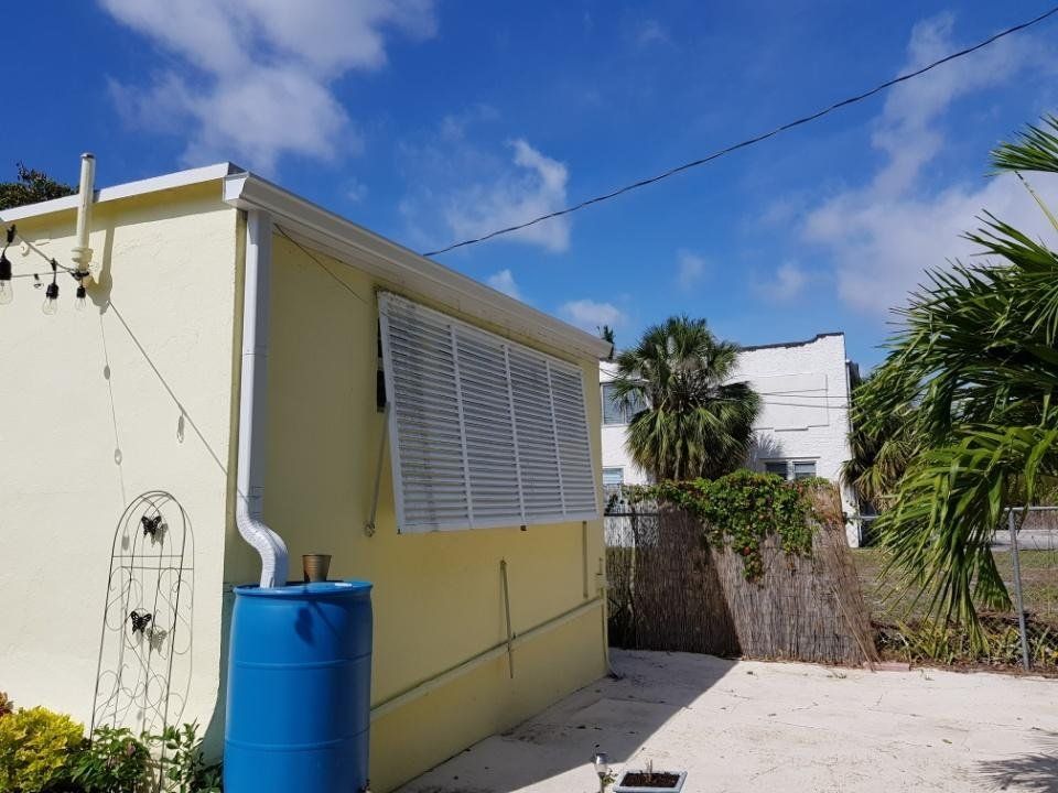 White Gutter and Rectangular Downspouts — Beach, FL — Enterprise Seamless Gutters