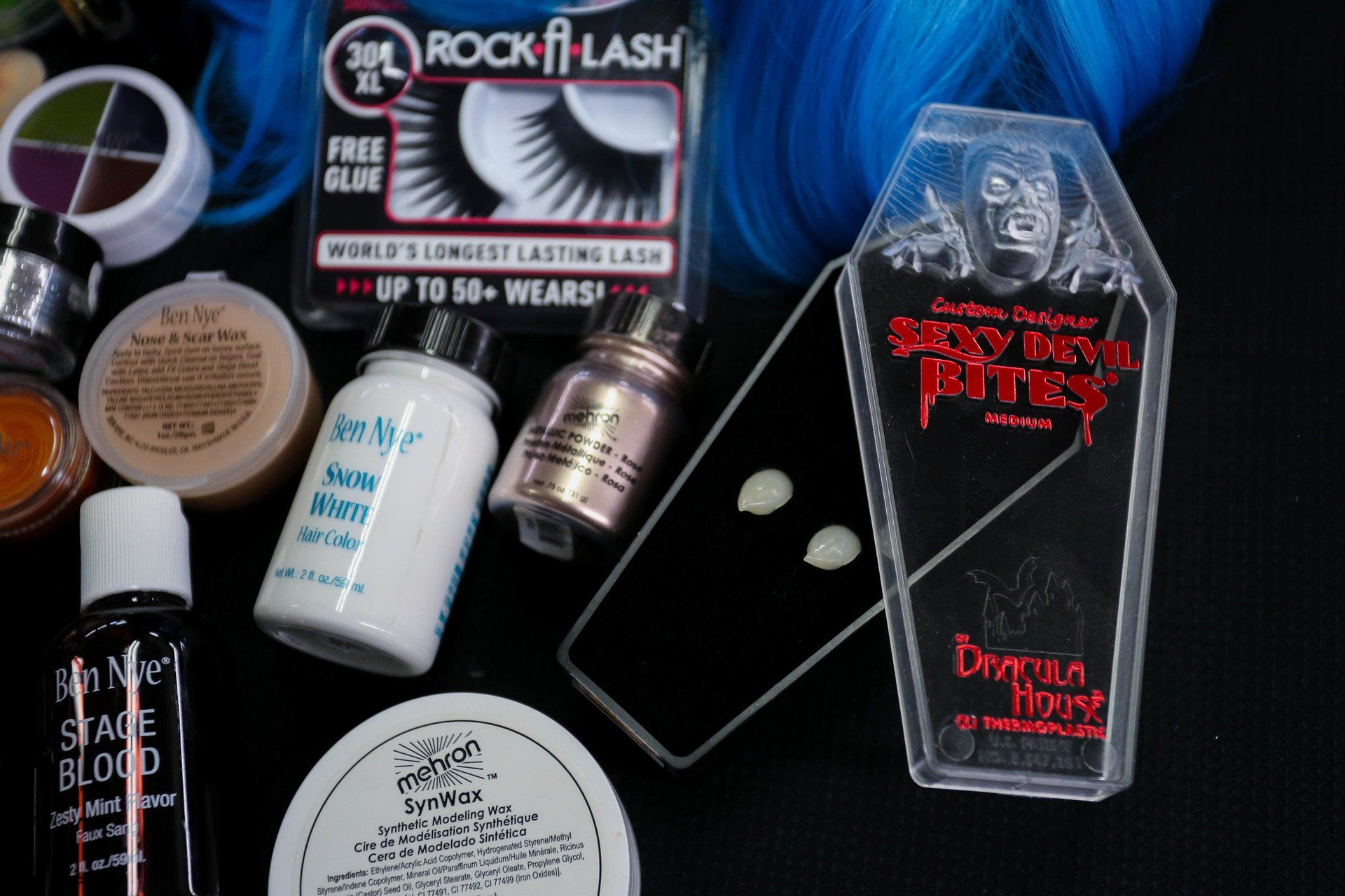 costume fangs, liquid latex, fake eyelashes