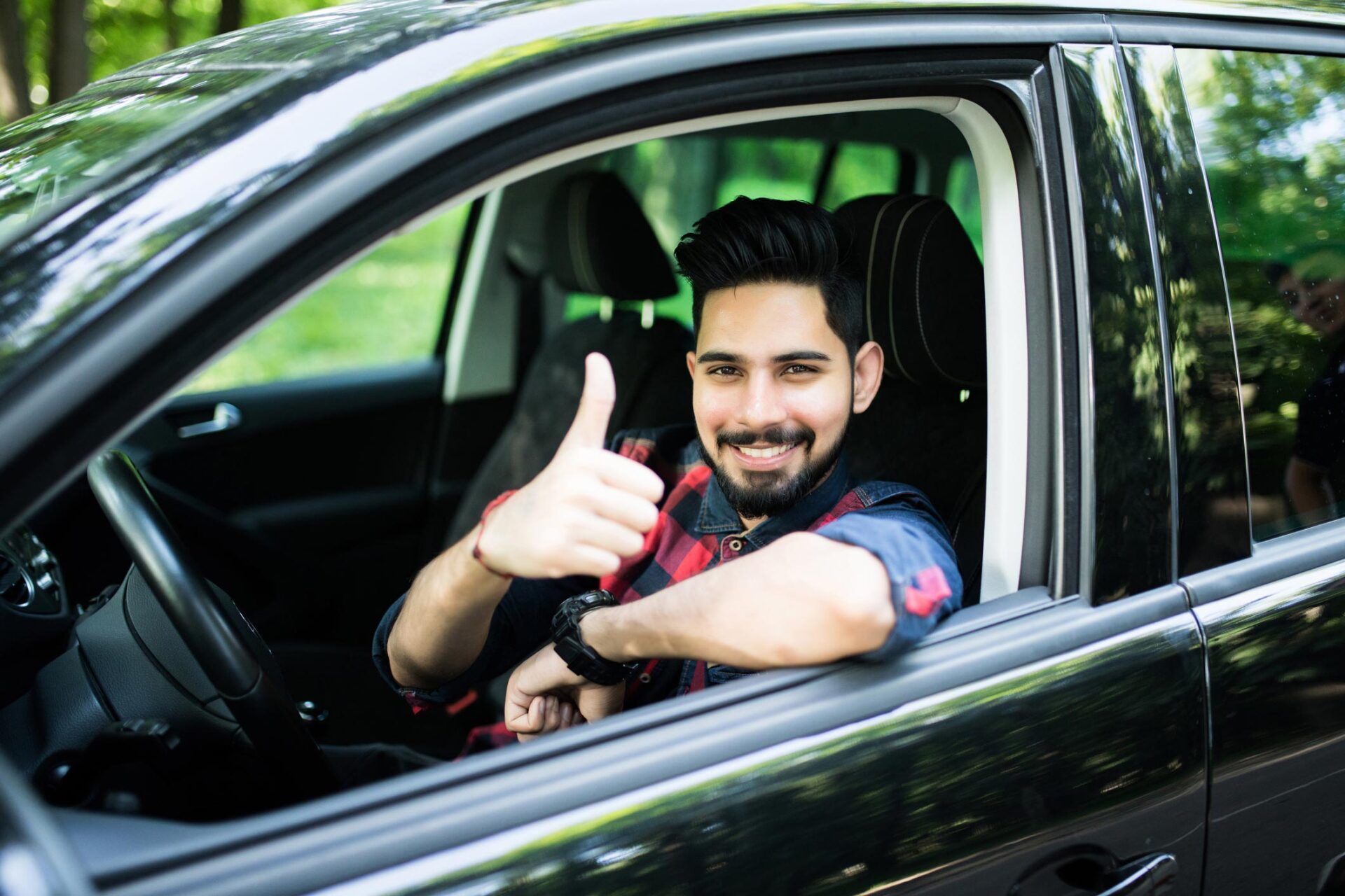Man Showing Thumbs Up — Homestead, FL — South Dade Auto Tag Agency