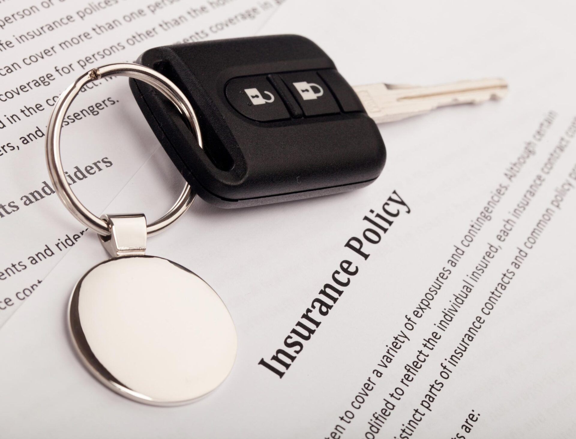 Car Insurance Paper and Car Key — Homestead, FL — South Dade Auto Tag Agency