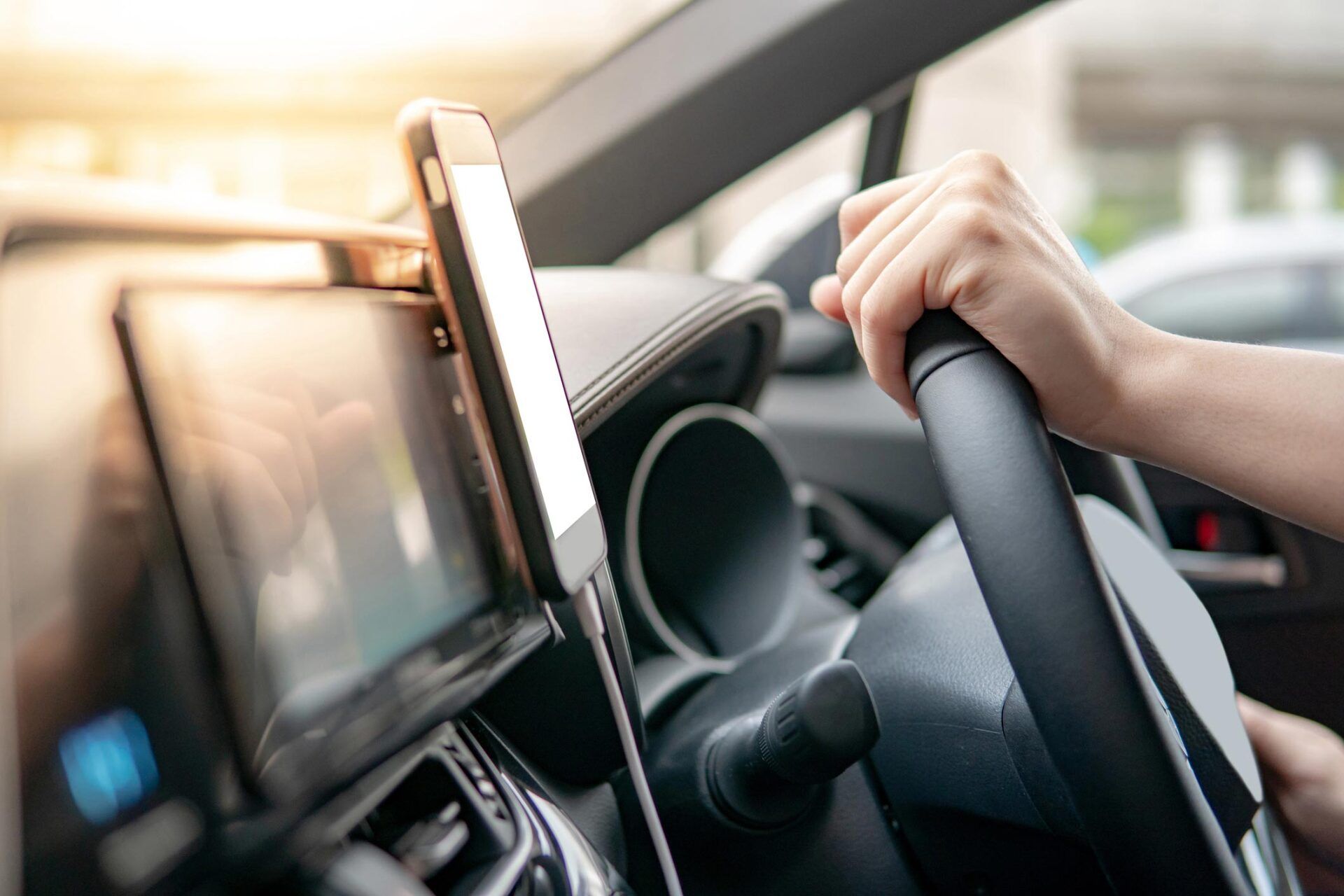 Male Driver Hand Holding on Steering Wheel — Homestead, FL — South Dade Auto Tag Agency
