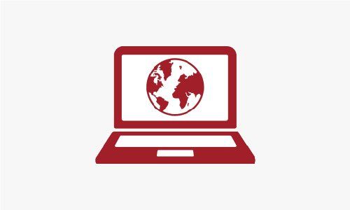 Ein roter Laptop mit einem Globus auf dem Bildschirm.