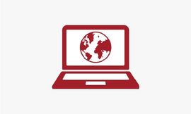 Ein roter Laptop mit einem Globus auf dem Bildschirm.
