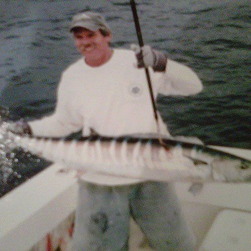 Man  Holding a White Fish — Dania FL — Ironclad Welding