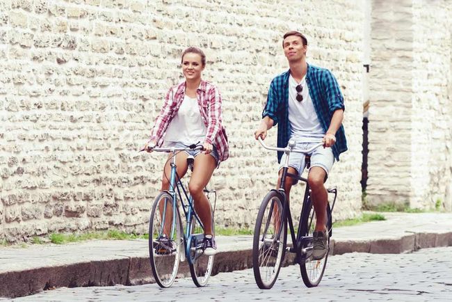 Friends riding bikes together during an addiction recovery journey.