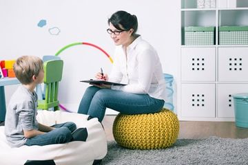Family Counseling — Therapist Talking To A Boy in Fresno, CA