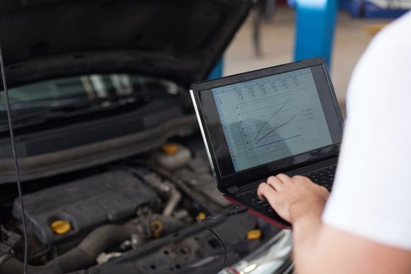 mechanic performing electrical diagnostics