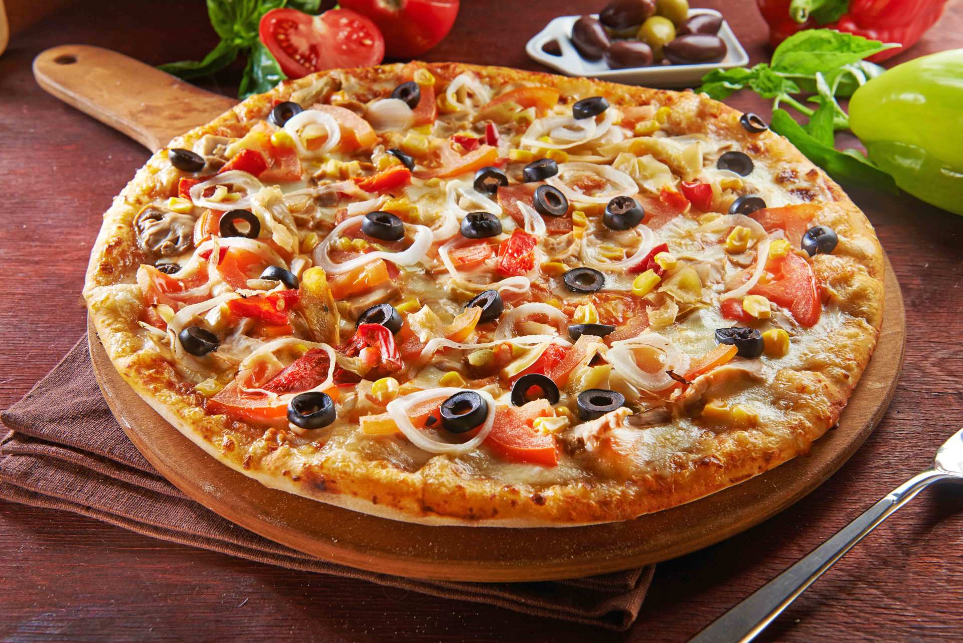 Whole Italian Pizza On Wooden Table — Holyoke, MA — Amedeo's