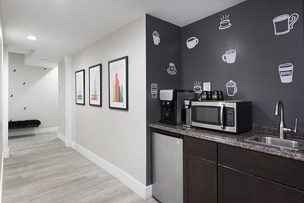 Shared kitchenette, filtered hot and cold water, and coffee for the office suites in Glen Cove NY