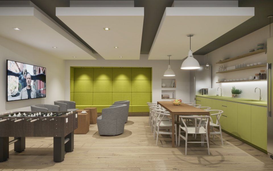 Game room and kitchen area in coworking space in Woodmere NY