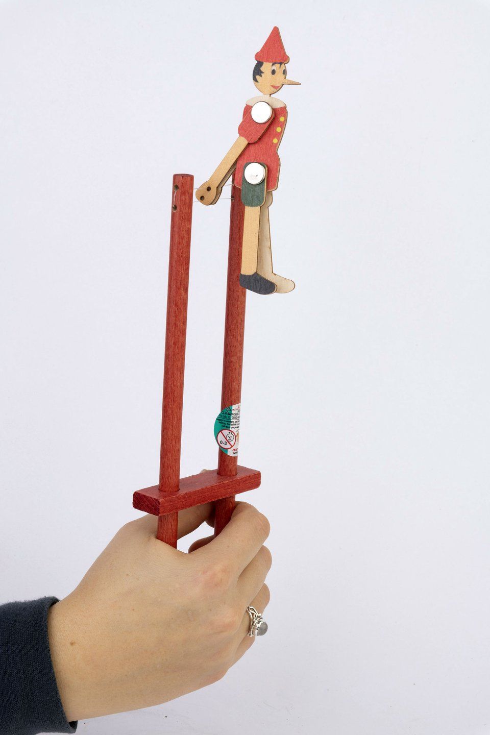 Wooden Pinocchio acrobat game