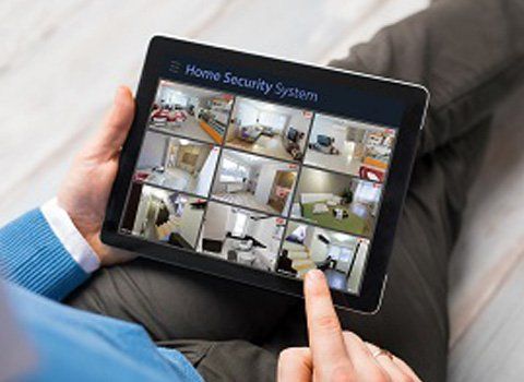 Cook County — A Man Holding A Smart Tablet In Merrillville, IN Cook County — A Man Holding A Smart Tablet In Merrillville, IN