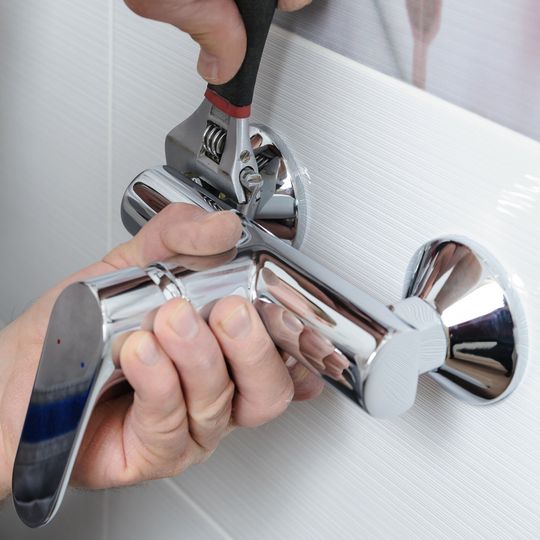 Installing Shower Faucet — Bloomington, MN — Richfield Plumbing Company Installing Shower Faucet — Bloomington, MN — Richfield Plumbing Company