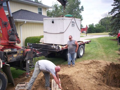 Septic Tank Cleaning — Client Talking With The Septic Contractor In Mansfield, OH Septic Tank Cleaning — Client Talking With The Septic Contractor In Mansfield, OH