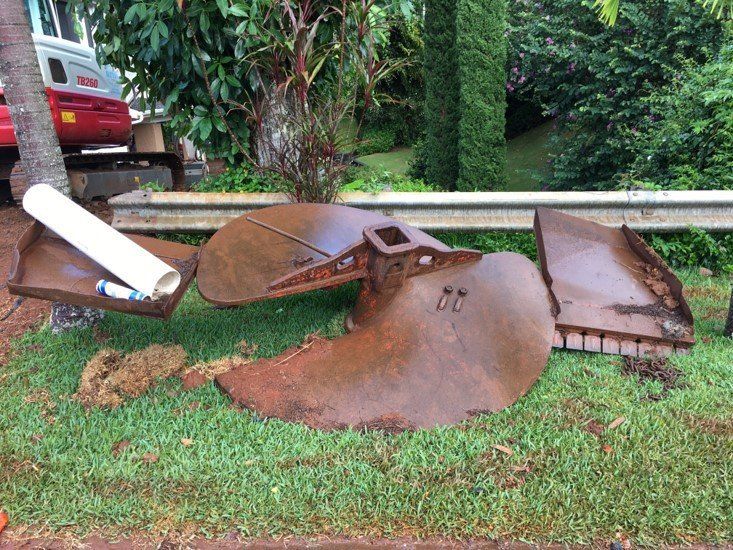 septic tank parts lying in garden