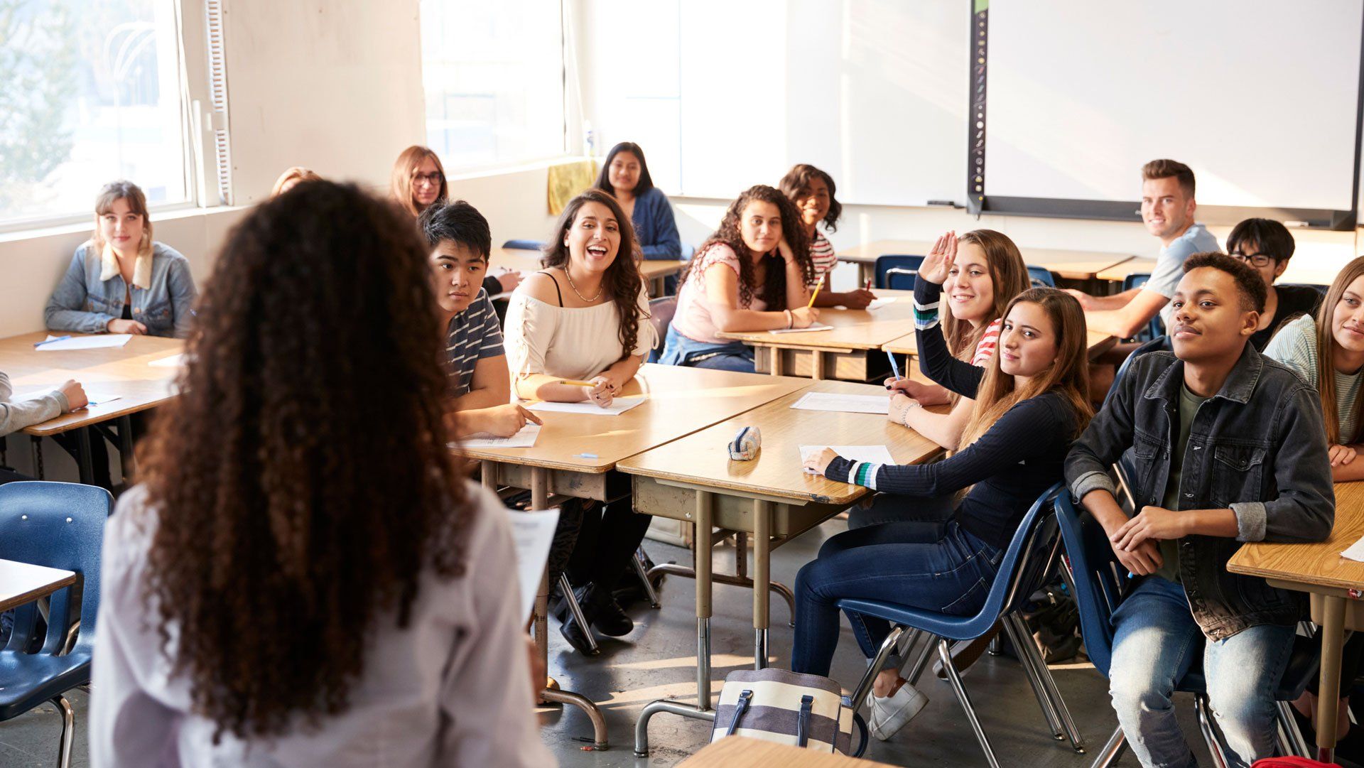 Room with Teacher and Students — Miami, FL — Security Bond Associates, Inc.