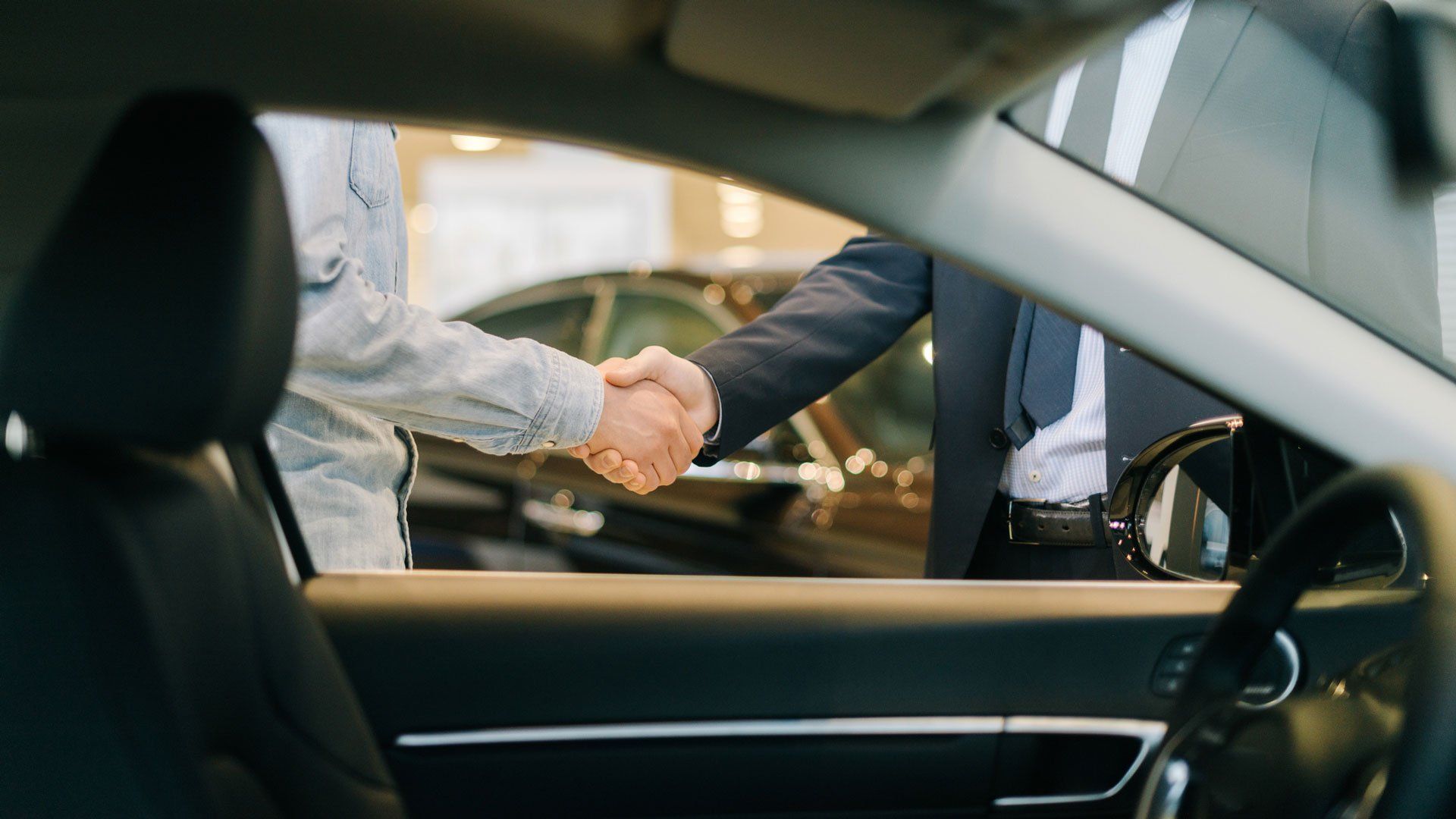 View of Handshake from Inside of The Car — Miami, FL — Security Bond Associates, Inc.