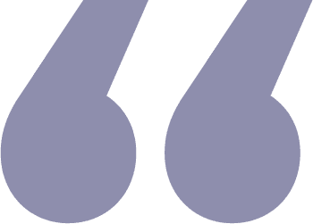 A pair of purple quotation marks on a white background.