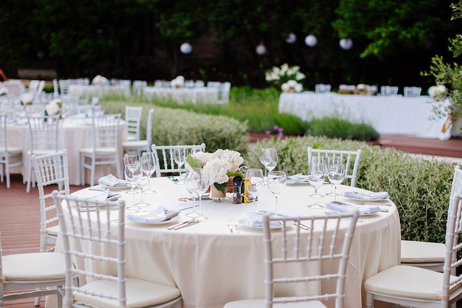 Venue Event Celebration — Wedding Table Coverage with Flowers in Dallas, TX