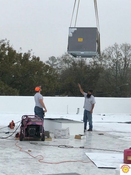 installing HVAC on the roof 1
