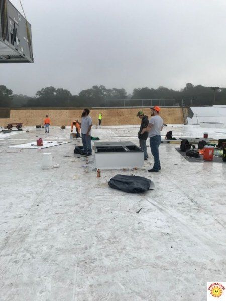 installing HVAC on the roof 3