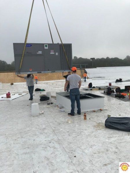 installing HVAC on the roof 4