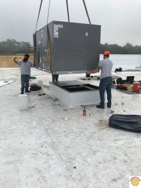 installing HVAC on the roof 5