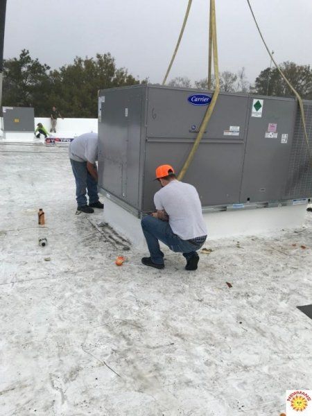 installing HVAC on the roof 6