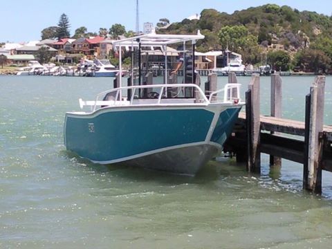 commercial vessel docked on the harbour