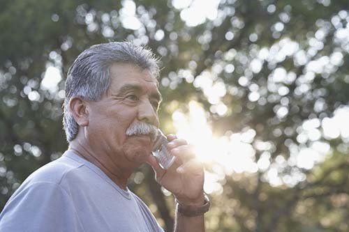 man callling for well drillers in Benedict, NE