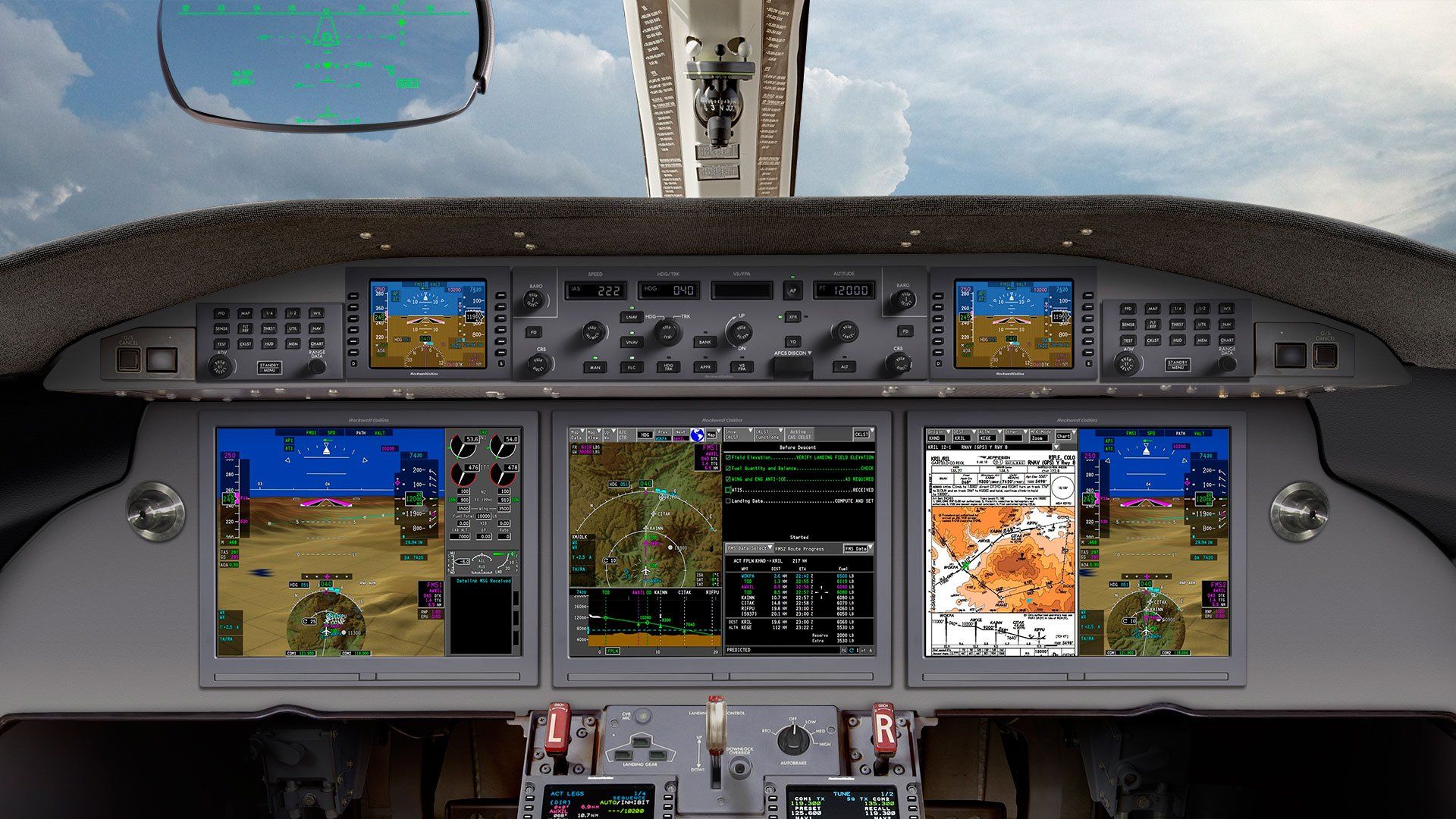 A cockpit of an airplane with a few monitors including one that says ramn