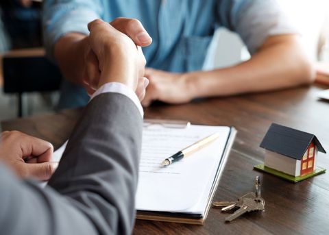 Real Estate Law — Handshake with Attorney in Columbus, OH Real Estate Law — Handshake with Attorney in Columbus, OH