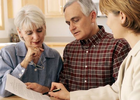 Estate Attorney — Attorney Explaining to Old Couple in Columbus, OH Estate Attorney — Attorney Explaining to Old Couple in Columbus, OH