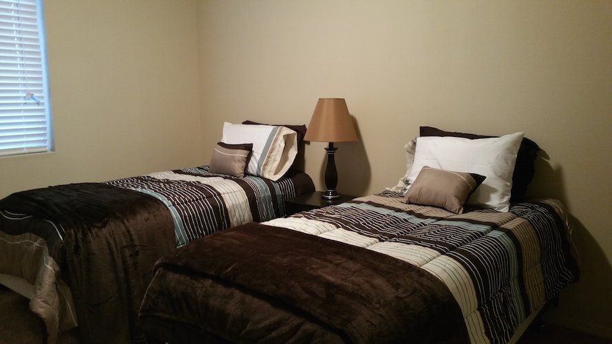Two twin beds in a bedroom