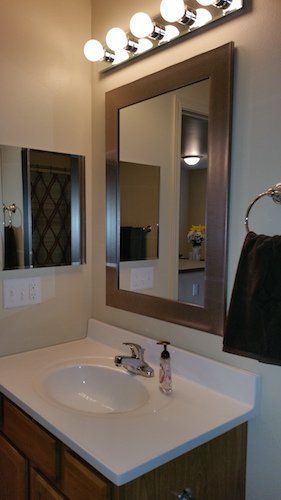 Close-up of vanity in full bathroom