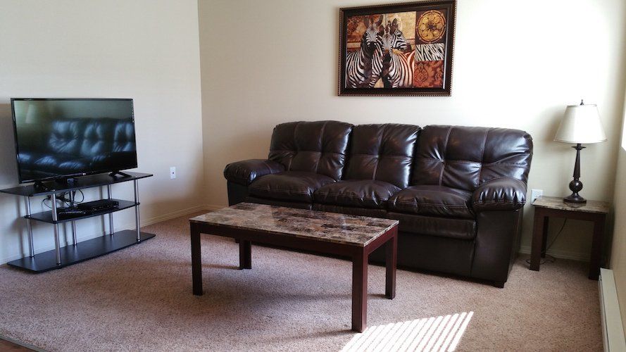 Staged living room in one of the townhomes