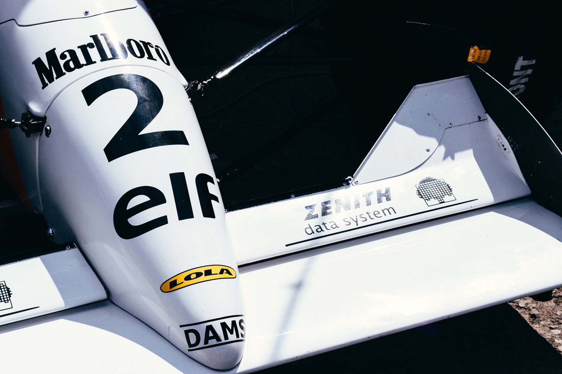 A close up of a marlboro 2 elf race car