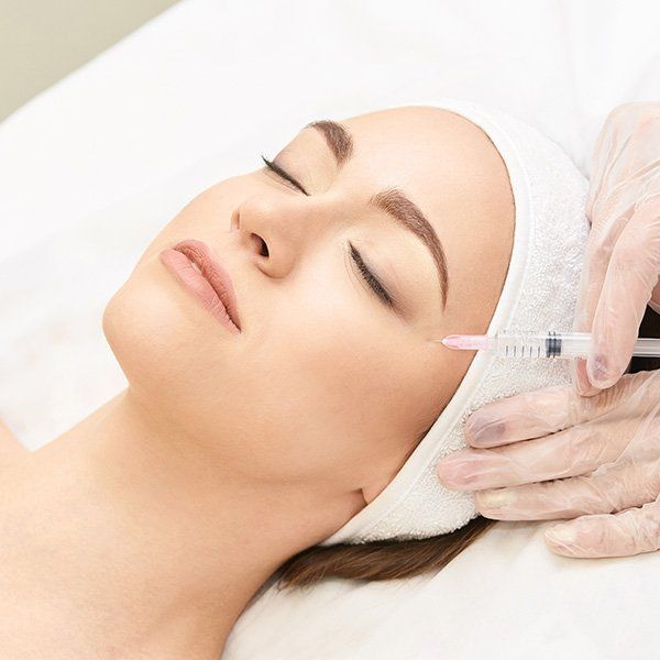 Woman Getting an Injection โ Metairie, LA โ Dr. Carter D. Paddock