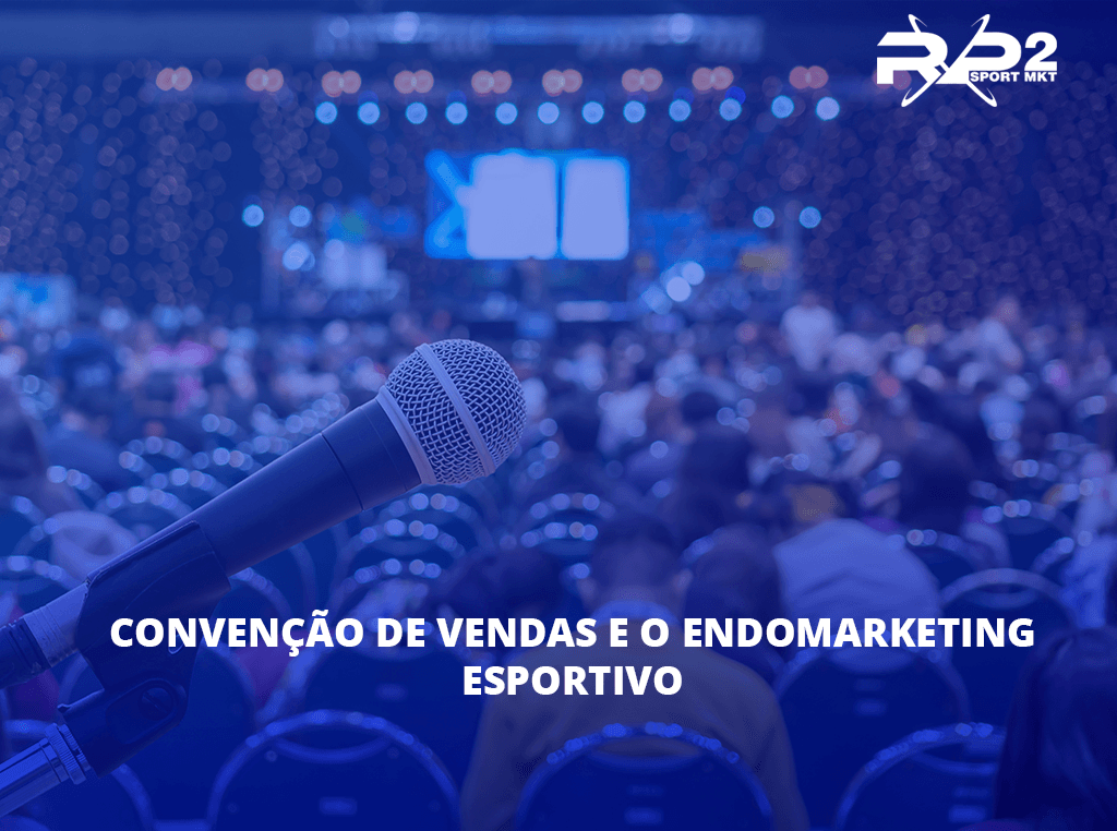 Microphone in foreground, facing a large audience at a conference. Text: