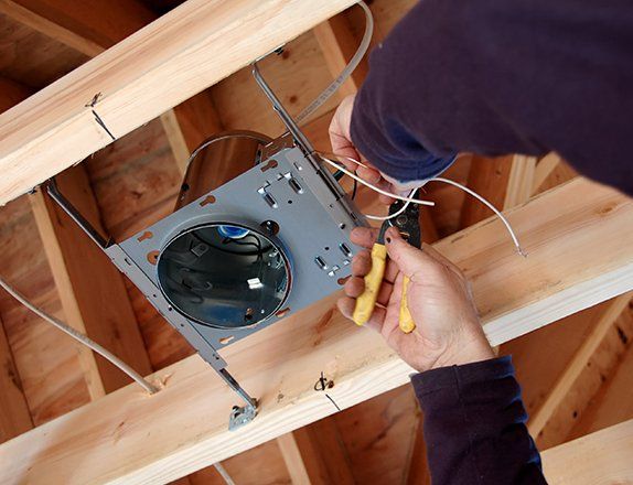 Electrician Installing Light Box — Clairsville, OH — Bryan Electric Inc.